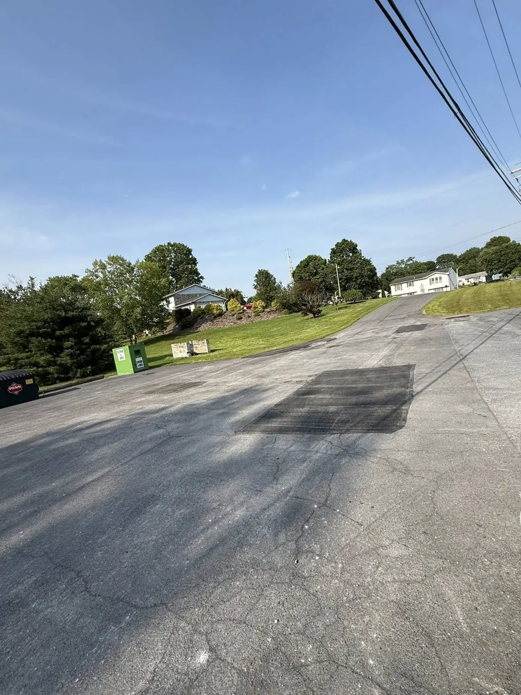 Finished asphalt surface, compacted with the edges sealed